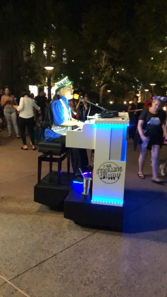 disney springs traveling piano player