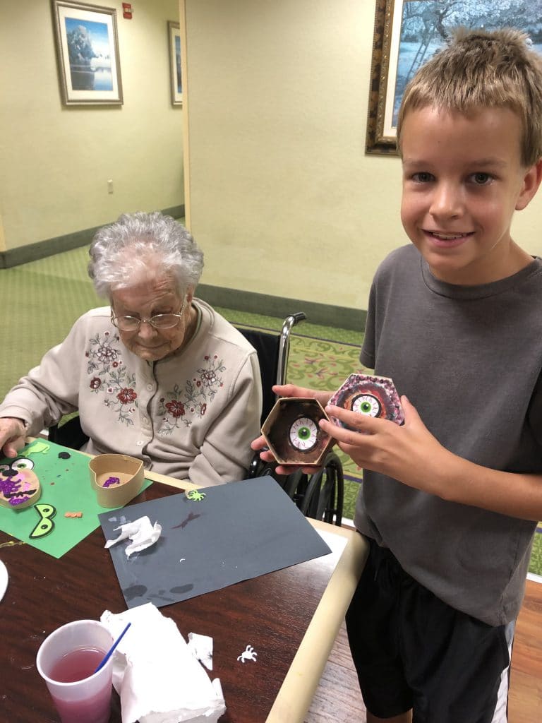 volunteering with kids at nursing home